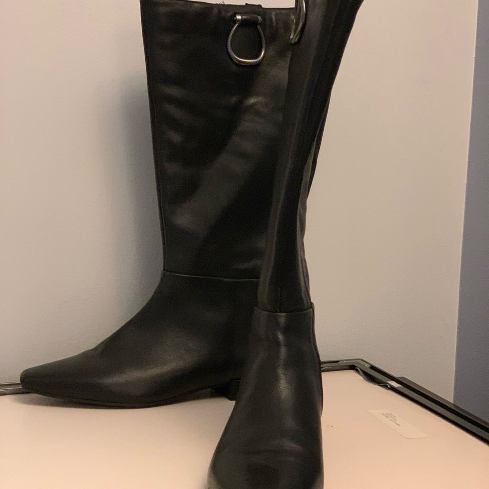 These boots have been worn once due to unforeseen foot surgery.